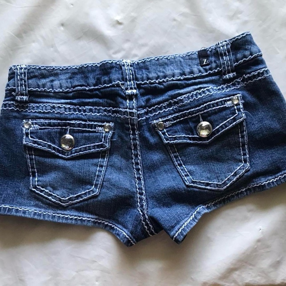 Low Rise Dark Blue Jean Shorts with White Stitching and Rhinestone Buttons - Picture 2 of 5